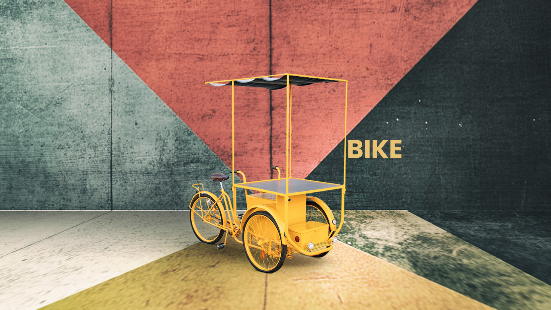 Una bici a tre ruote gialla, con un piano lavoro